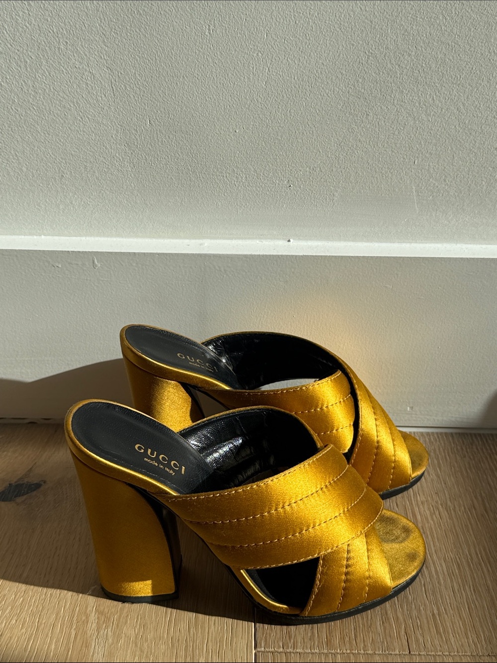 Gucci Women’s Satin Gold Cross-Strap Block Heel Mules